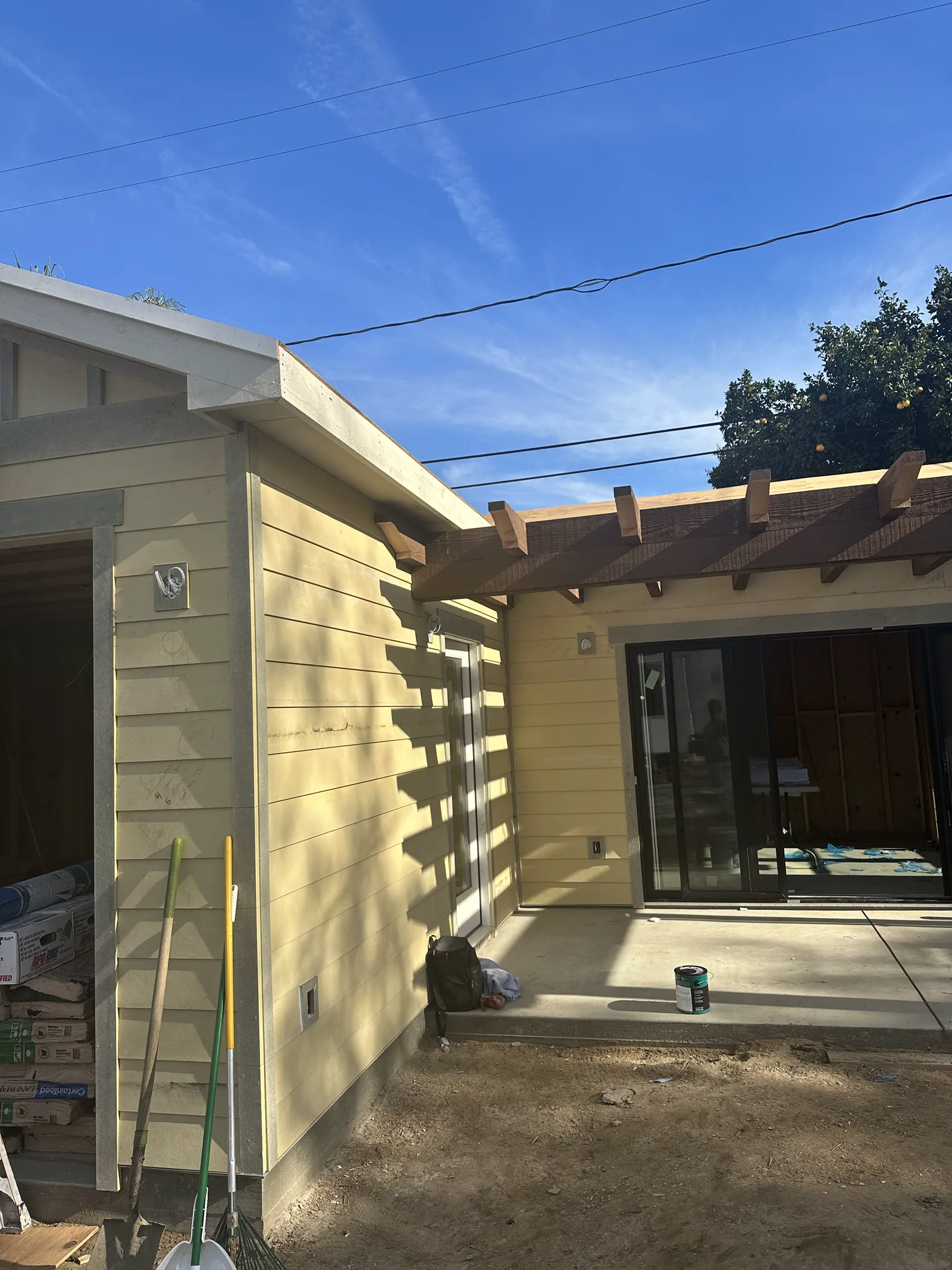 Siding repair in progress on an Arcadia property