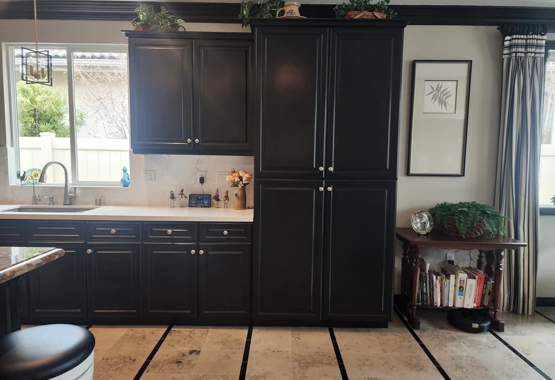 Pasadena kitchen with charcoal painted cabinets and white counters