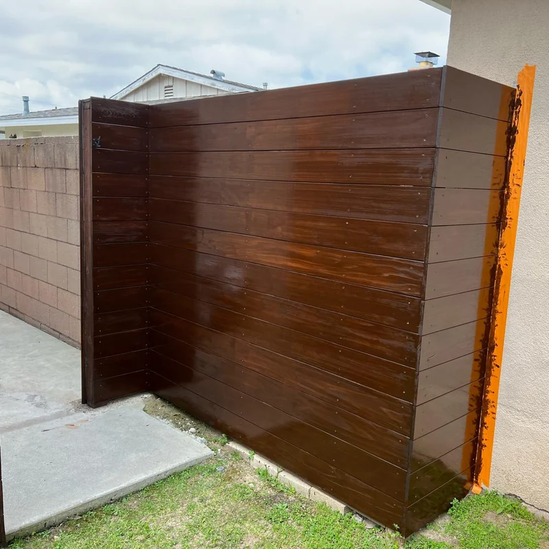 Wood fence after refinishing