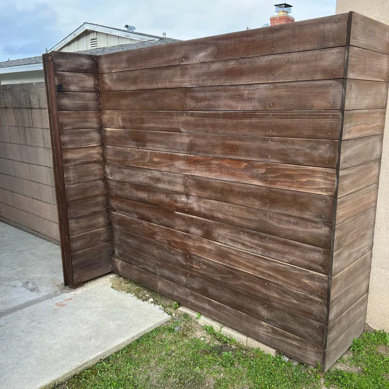 Wood fence before refinishing