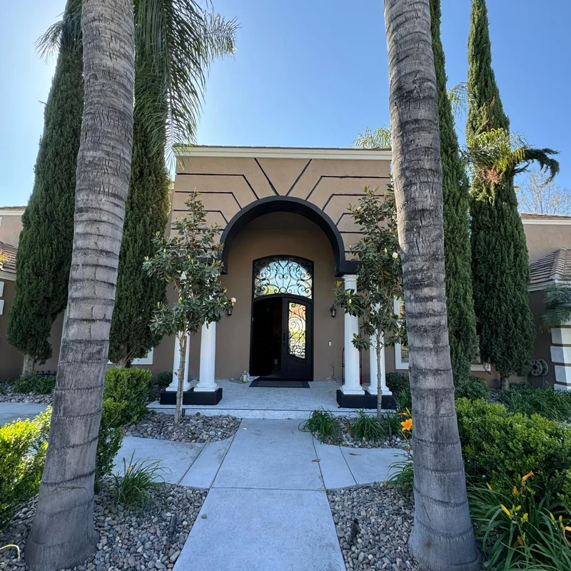 Arched home entry after exterior painting