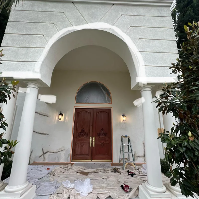 Arched home entry before exterior painting
