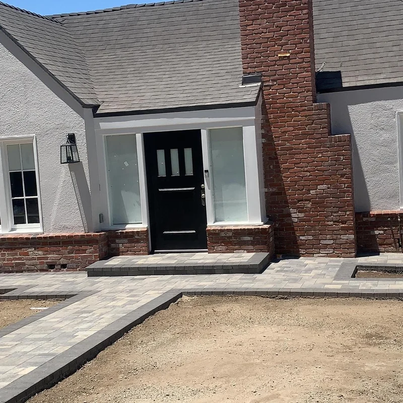 Brick and stucco home before repainting