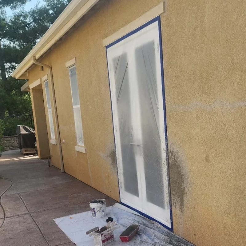 Warm stucco exterior before repainting