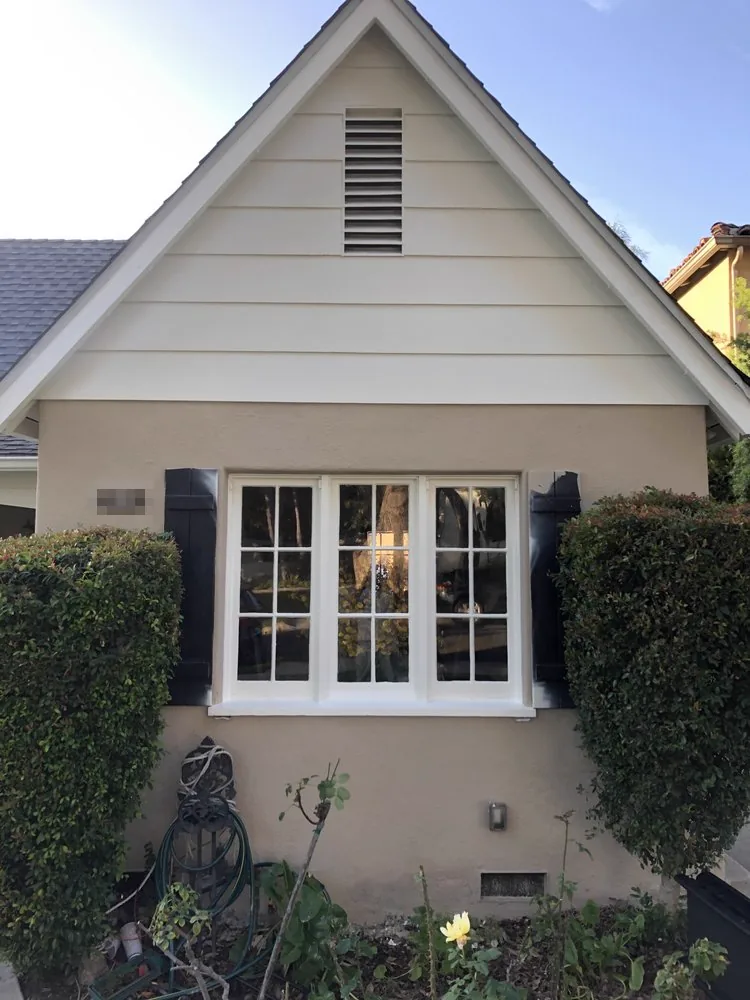 San Gabriel home with a cream gable over tan stucco after exterior repainting