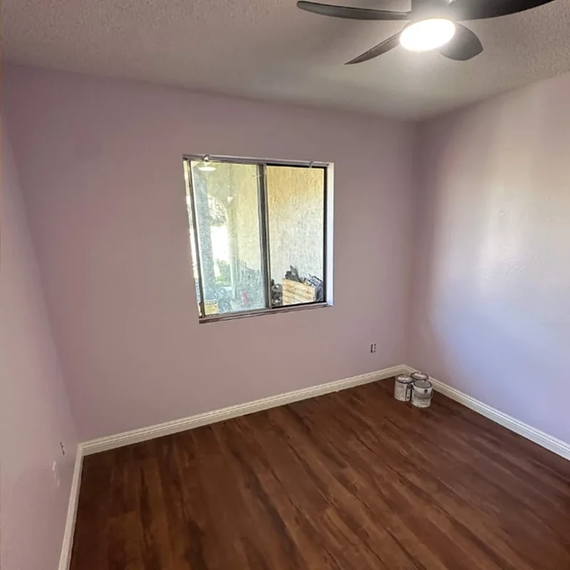 Bedroom after lavender wall repainting