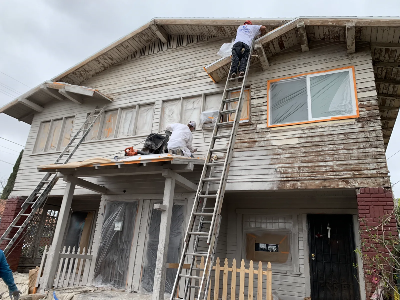 Crew working on an exterior elevation