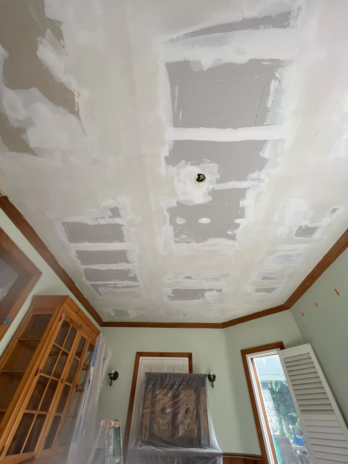 Repair feathered out and texture matched to the surrounding wall, Pasadena