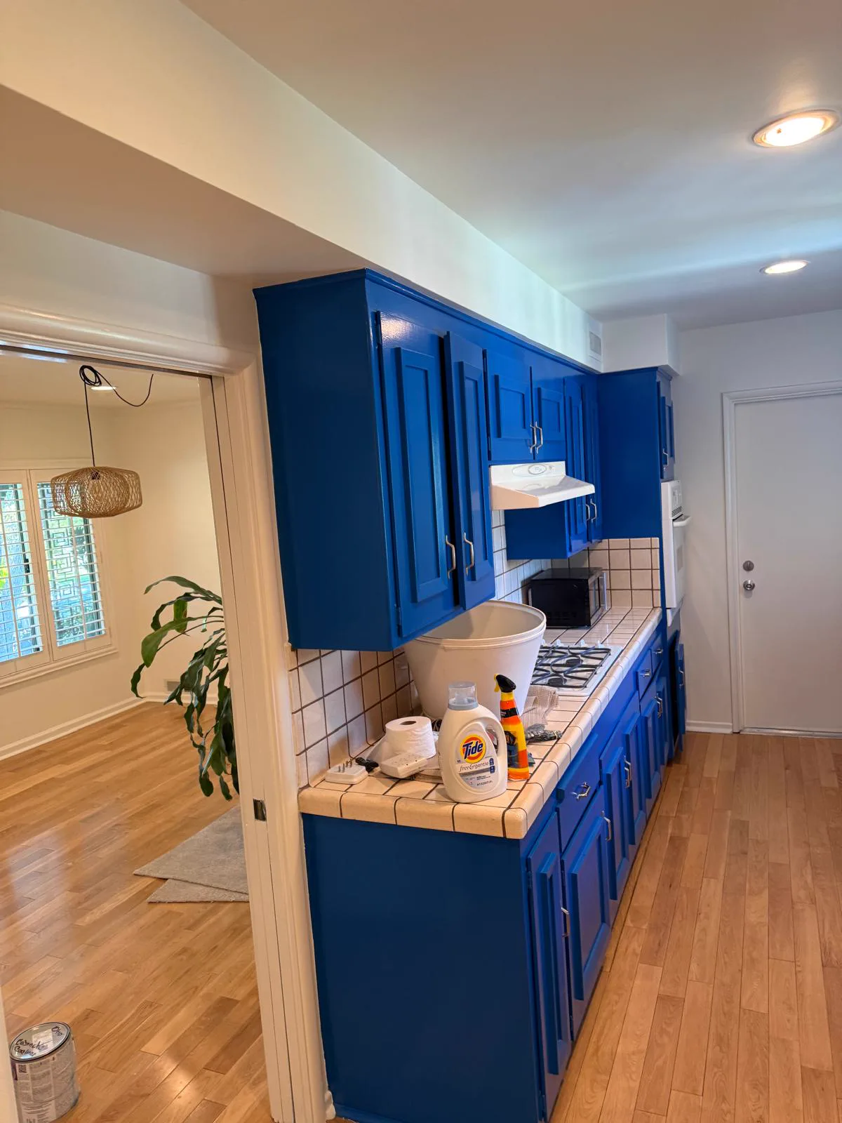 Refinished cabinet doors and hardware reinstalled in a San Gabriel kitchen