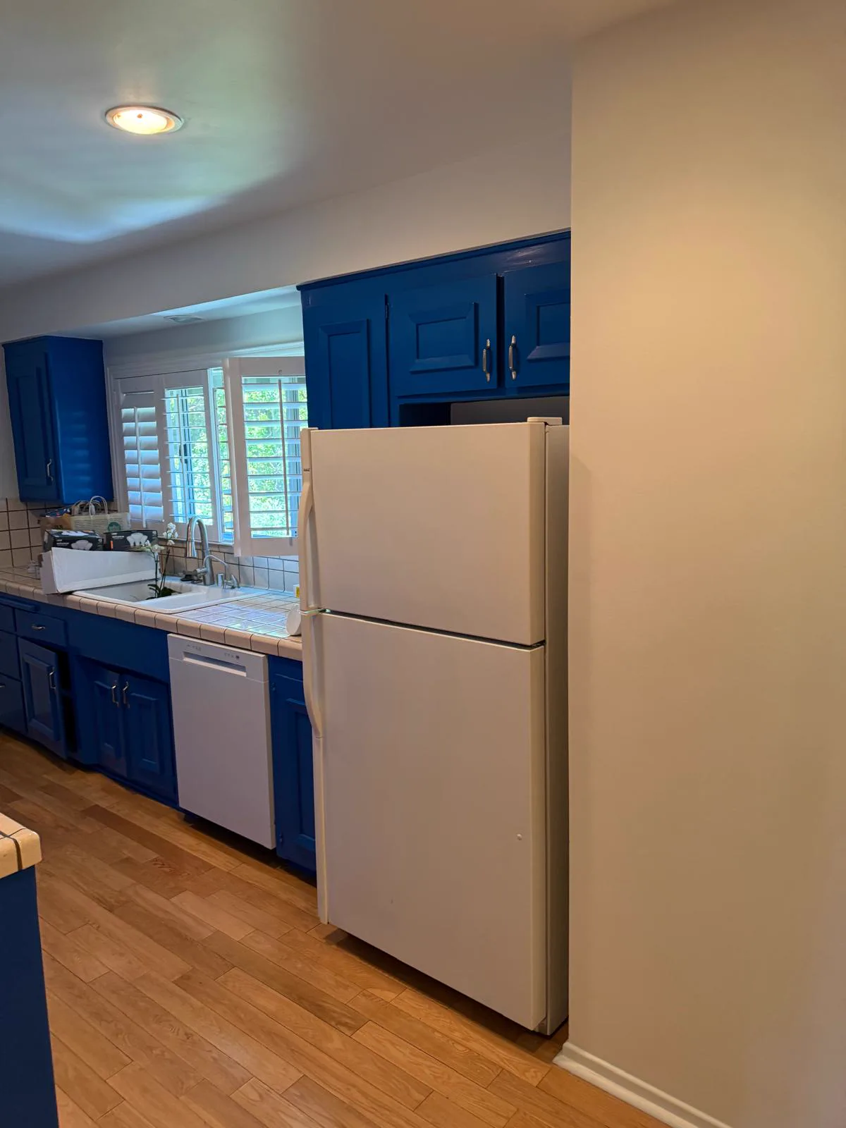 Finished kitchen cabinetry after refinishing, San Gabriel