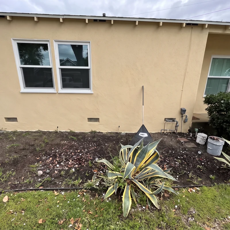 Stucco wall after repair and repainting
